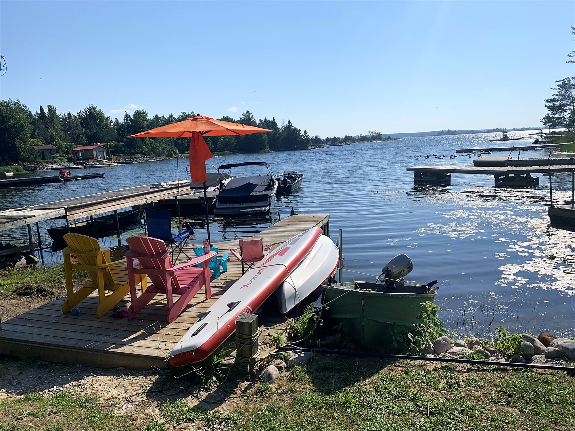 The private dock with Muskoka chairs on Georgian Bay
