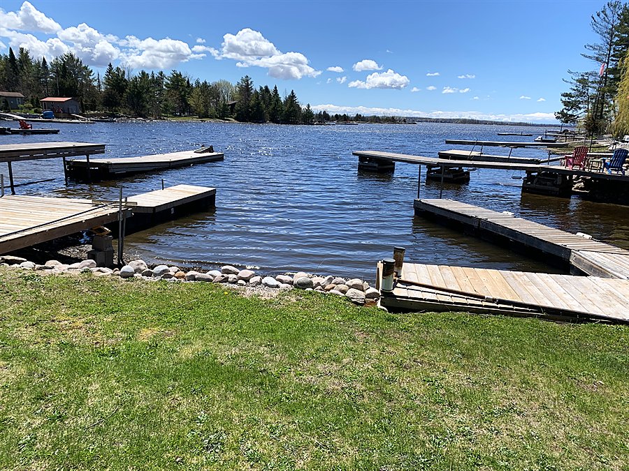Docks along the shoreline on a sunny day