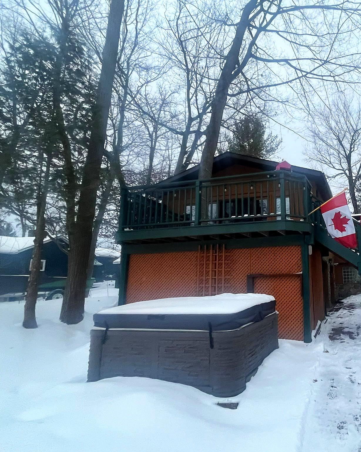 The house and hot tub in winter snow